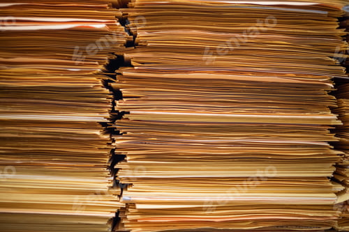 Preview: Close up shot of assortment of yellow folders