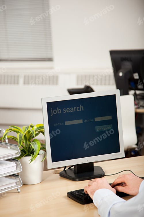 Preview: Office worker using computer for job search