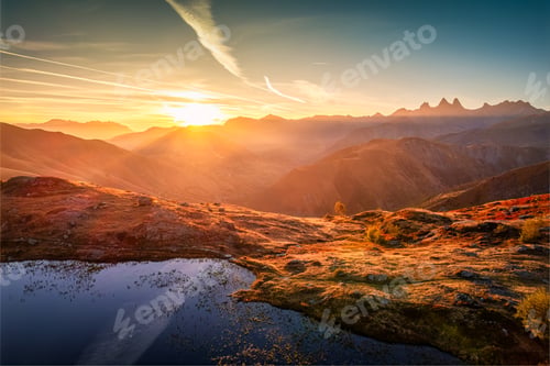 Preview: Landscape of sunrise shines over Lac Guichard with Arves massif in autumn at Aiguilles dArves