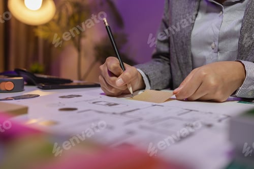 Preview: a beautiful female architect is working in her private office