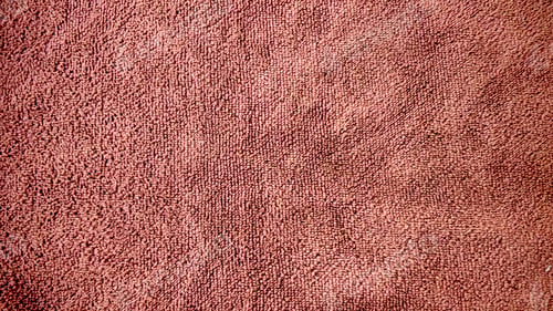 Preview: Close-Up of a Textured Brown Fabric Surface of a Face Towel