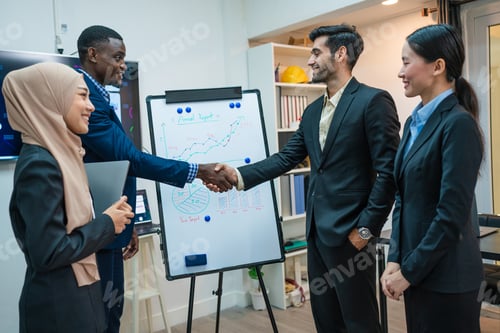 Preview: Business people are working and shaking hands while working.