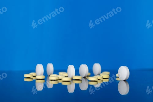 Preview: Closeup of pills on a blue background