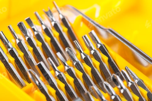 Preview: Set Of Screw Tips And Extensions With The Screwdriver In The Yellow Toolbox