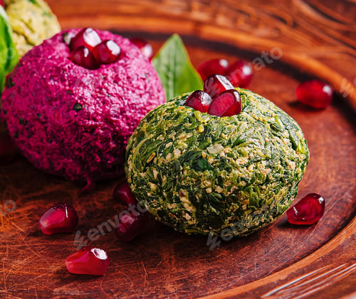 Preview: Colorful vegetarian falafel balls with pomegranate seeds
