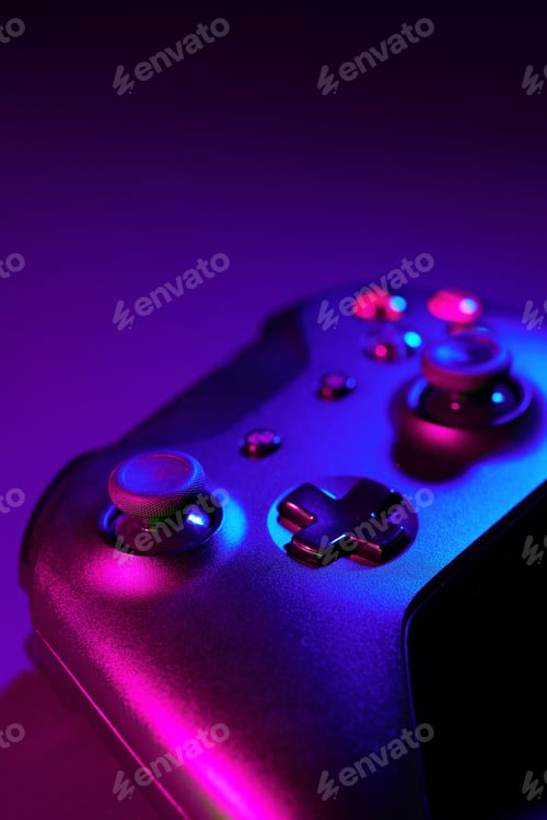 Preview: Gaming joystick on black background in neon light