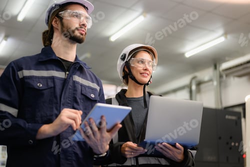 Preview: Technician engineer team checking and repairing part of automatic machine