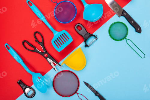 Preview: Kitchen utensils isolated on red-blue background