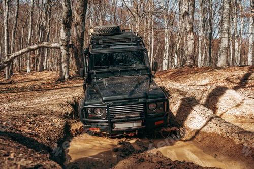 Preview: Offroad car driving through the forest road of mud