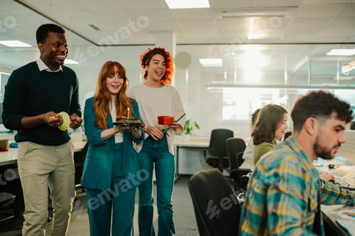 Preview: A diverse colleagues surprising a businessman with a birthday cake.