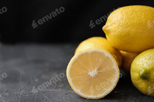 Preview: ripe lemons on grey background. Fresh juicy lemons