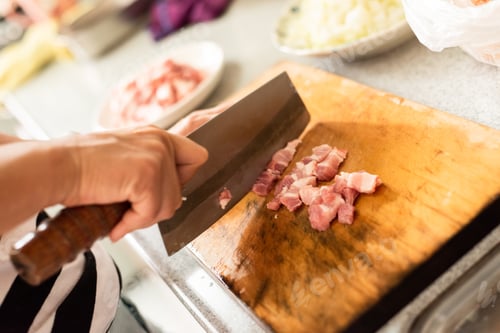 Preview: Cut Raw Pork On Wooden Table In The Kitchen