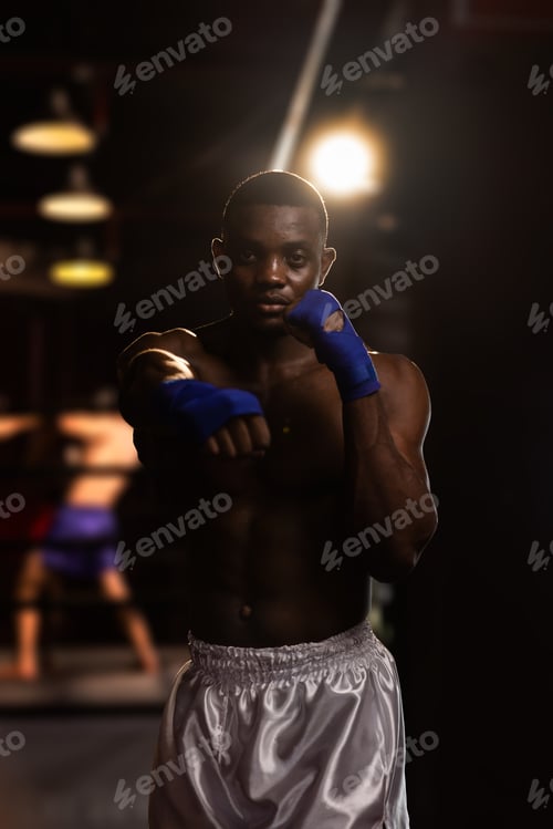 Preview: African American boxer training at the gym.