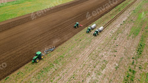 Preview: Tractors working seamlessly in unison exemplifies the spirit of rural life, where farm equipment and