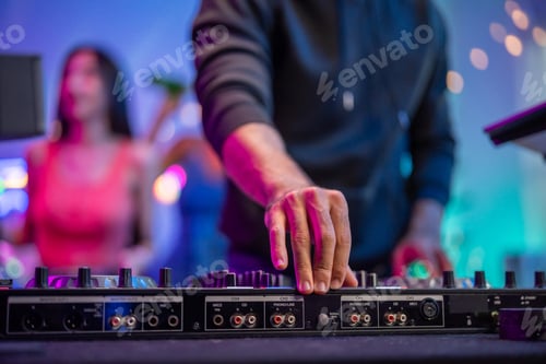 Preview: Close up of man artist DJ mixing and scratching music mixer controller.