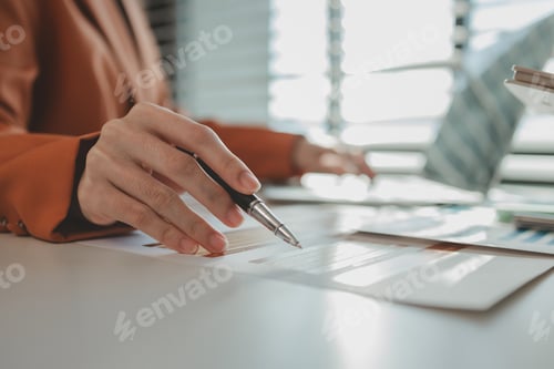 Preview: employees sit in an office with a pile of documents that need to be completed before work ends, entr