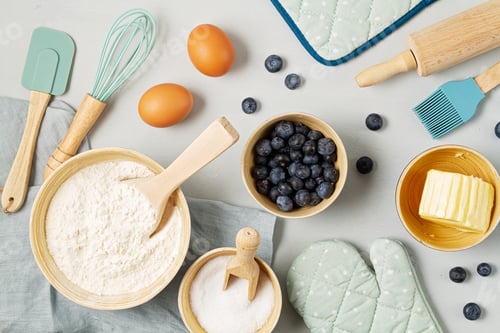 Preview: Rustic baking ingredients flat lay. Homemade pastry, baking. Top view flat lay background. Copy