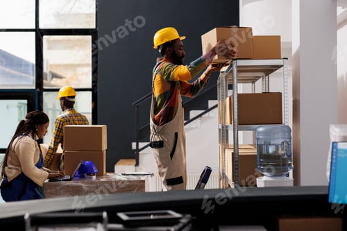 Preview: Warehouse managers team picking buyer order and choosing box