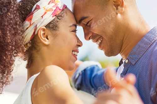 Preview: African couple looking at each other