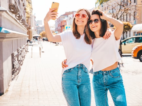 Preview: Two beautiful women posing outdoors