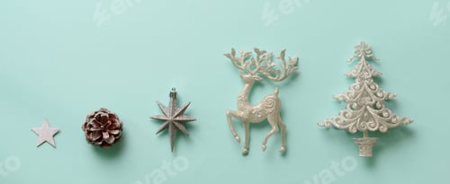 Preview: Silver Christmas decoration - deer, fir-tree, stars, cone on blue background with copy space