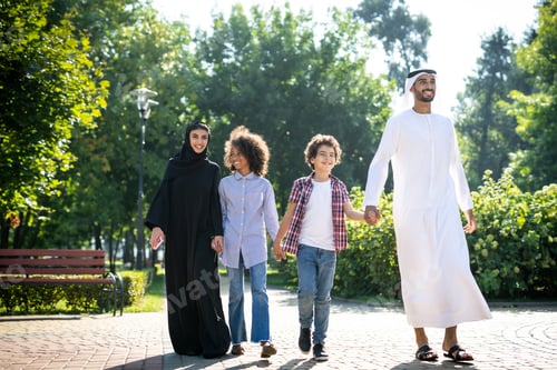 Preview: Cinematic image of a family from the emirates spending time at the park