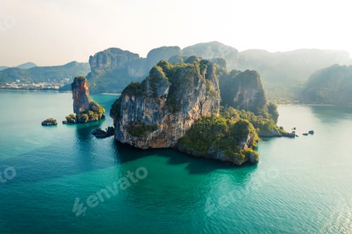 Preview: summer view of rocky mountains and sea in a tropical morning