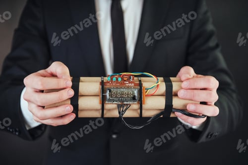 Preview: Man terrorist in a black suit with explosives