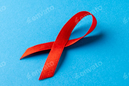 Preview: Composition of red ribbon on blue background