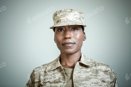 Preview: Studio portrait of confident female soldier