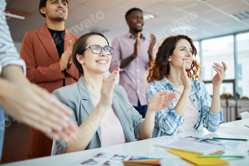 Preview: Business People Clapping in Meeting