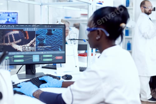 Preview: Multiethnic researcher team doing investigation in modern facility