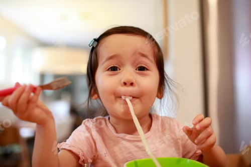 Preview: Happy kid slurping noodles