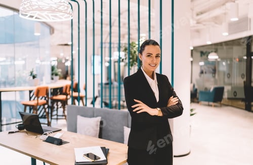 Preview: Smiling woman in formal wear at office