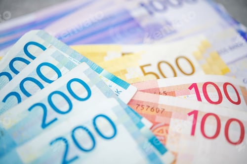Preview: Norwegian Krones Banknotes on a Table