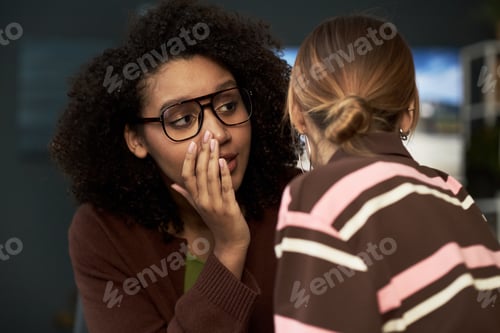 Preview: Two Women Gossiping About Their Colleagues