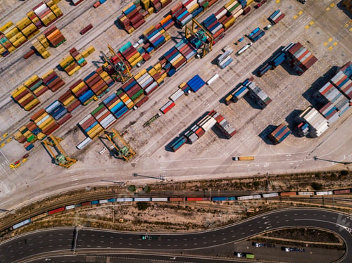 Preview: Industrial Cargo area with container ship in dock at port, Aerial view