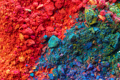Preview: Background of scattered crashed eye shadows of different colors