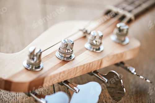 Preview: How to Tune a Guitar Close-up view of guitar headstock with keys for adjusting guitar strings
