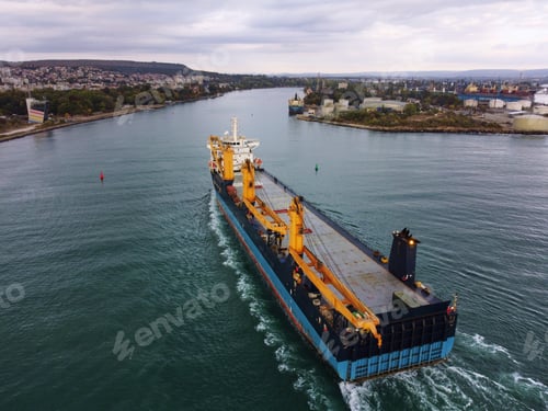 Preview: Aerial drone view of Large empty car cargo ship entering the port in Varna