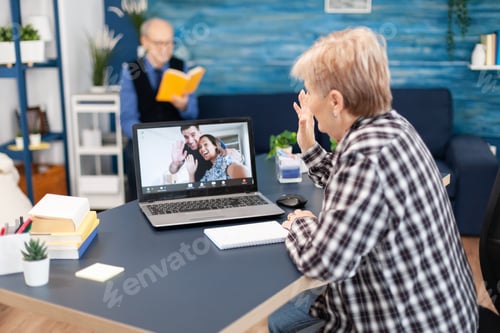 Preview: Excited smiling elder mature grandmother waving hand