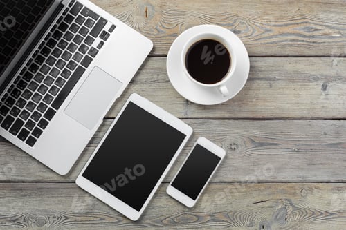 Preview: Open laptop with digital tablet and smartphone close up
