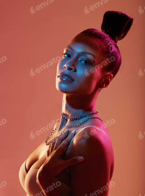 Preview: Portrait, fashion and kaleidoscope with a model black woman in studio on a neon background for beau