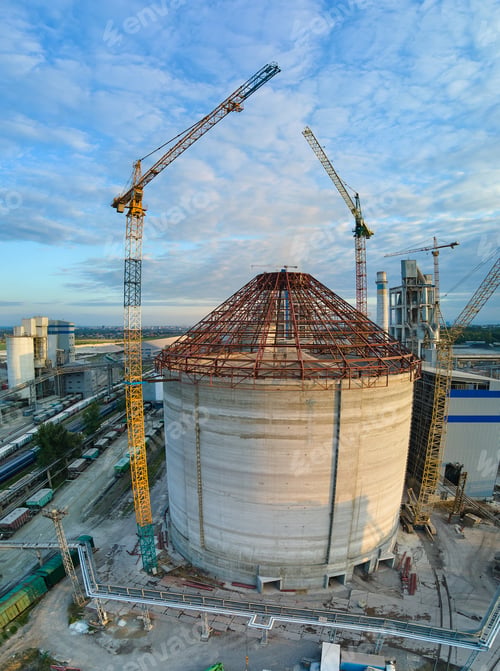 Preview: Aerial view of cement factory under construction with high concrete plant structure