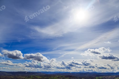 Preview: Rural landscape with blue sky and clouds.