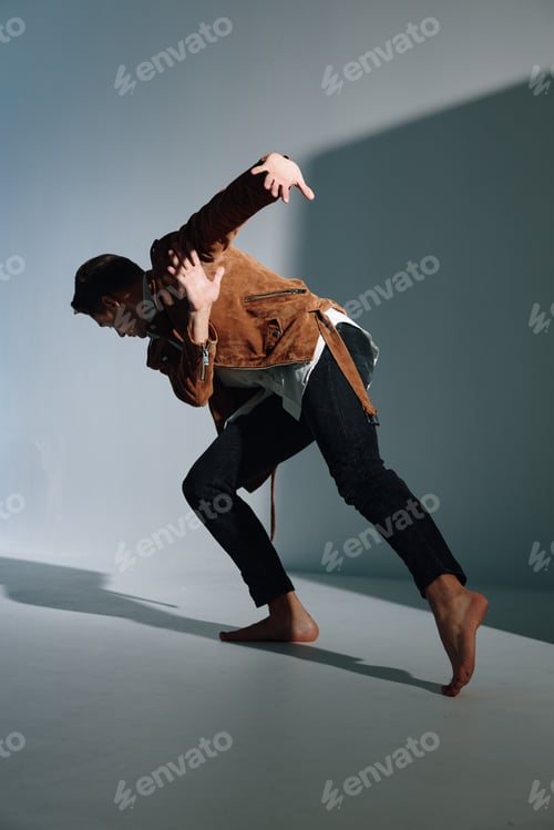 Preview: a man climbs up an inclined line indoors