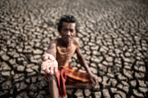 Preview: An elderly man was sitting asking for rain in the dry season, global warming, selective focus