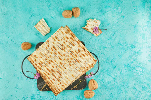 Preview: Pesach celebration concept - jewish Passover holiday. Matzah on stand made of marble