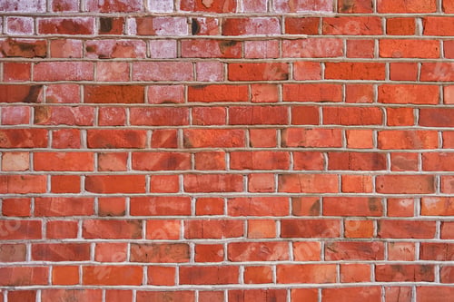 Preview: Old brick red wall, brickwork from an old brick in rustic style. Structure and pattern of destroyed
