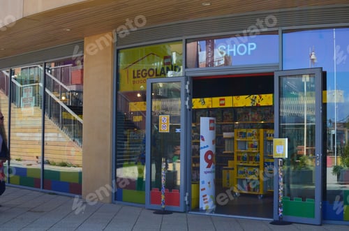 Preview: AMSTERDAM, NETHERLANDS - SEPTEMBER 10, 2022: Entrance to Lego store on city street
